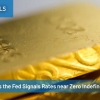 Gold rises as the Fed signals rates near zero indefinilely